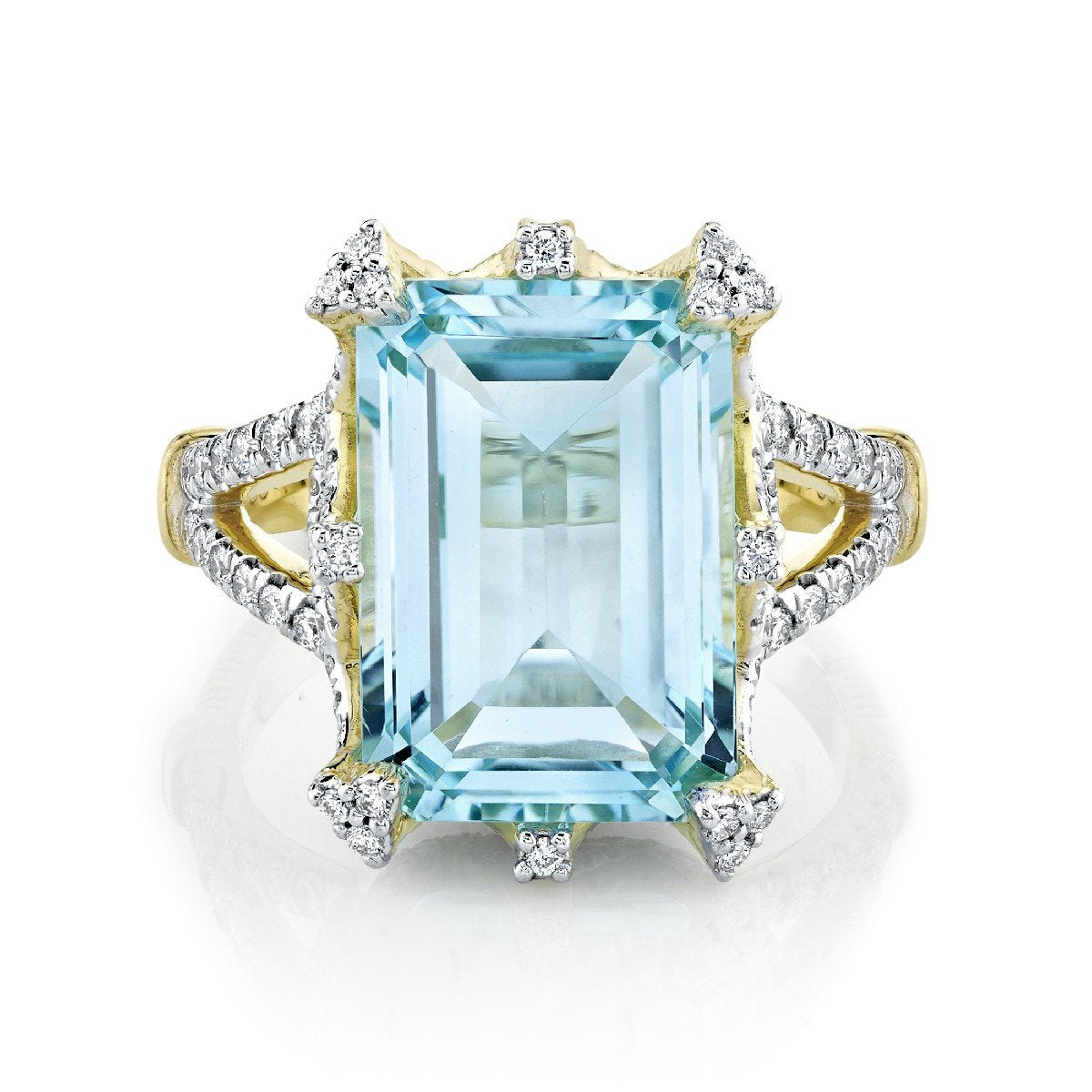 Emerald Cut Sky Blue Topaz Ring With Diamond Detail