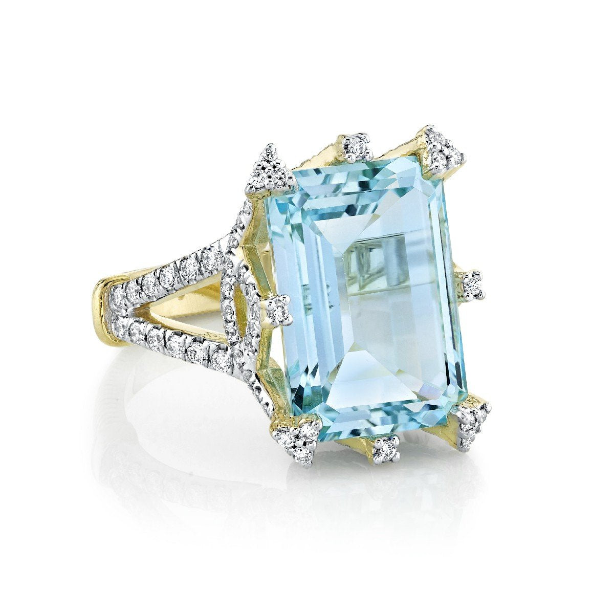 Emerald Cut Sky Blue Topaz Ring With Diamond Detail