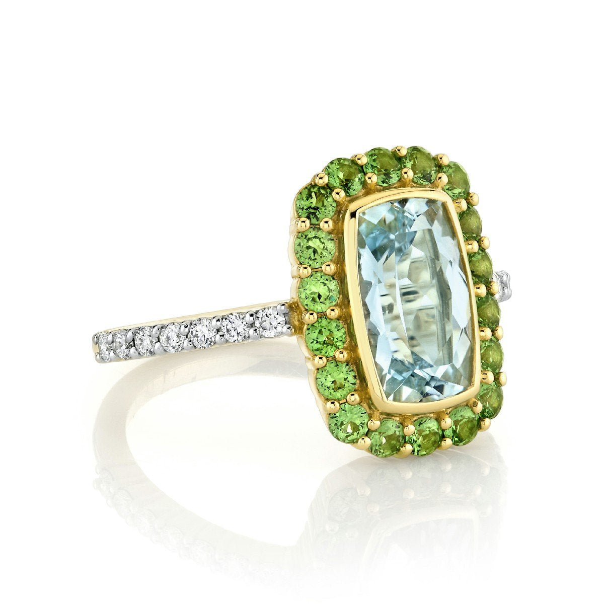 Sky Blue Topaz Ring With Tsavorite Halo And Diamond Shank